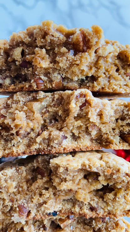 Close-up of a stack of pecan cookies with a blurred background